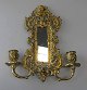 Wall 
application in 
bronze, 19th 
century with 
two light arms. 
Rococoform. H: 
24 cm.