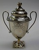 Danish empire 
vinaigrettes in 
silver, 
vase-shaped, c. 
1800. On square 
feet with 
decorations. 
...