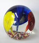 Antique letter 
weight&nbsp;of 
glass, 19th 
century. 
Decorated on 
inside with 
three flowers 
in ...