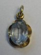 Pendant in 14K 
gold with 
aquamarine.