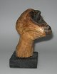 Malvin, Sven 
(1923 -) 
Sweden: Face. 
Carved wood. H: 
19 cm. Signed 
under the foot.
Provenance: 
...