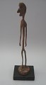 Malvin, Sven (1923 - ) Sweden: Face. Carved wood. Height: 10 cm. Designated below the foot. ...