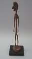 Malvin, Sven 
(1923 - ) 
Sweden: Figure. 
Carved wood. 
H.: 33 cm. 
Designated 
below the foot. 
...