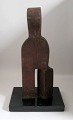 Martin, Harvey 
(1942 -) 
Denmark: 
Figure. Corten 
steel. Base of 
black marble. 
Signed.