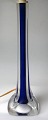 Flygfors table 
lamp in glass, 
Sweden, 
1960/70, cobolt 
blue molten 
glass with 
clear overlay. 
...