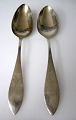 Par Danish 
empire 
tablespoons, 
1829, stamped: 
IG - unknown 
master. The 
spoons are 
decorated with 
...