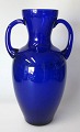 Glass Vase, 
cobalt blue 
glass, around 
1920. Amphora 
with handles. 
Presumably 
Germany. H .: 
20.5 cm.