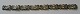 Bracelet in 
silver, 
Denmark, CA 
Christensen's 
eftf., 
Copenhagen 1937 
- 1947. 
Decorated with 
...