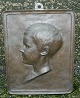 Relief of boy 
on plate made 
of bronze. Made 
in 1904 by the 
sculptor Johan 
Gudmundsen-
Holmgreen, ...