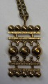 Finnish bronze 
jewelry, 1970. 
Decorated with 
bullets. Chain 
of brass. H .: 
4.5 cm. B .: 
2.6 cm. ...