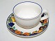 Royal 
Copenhagen 
Golden Summer, 
coffee cup with 
matching 
saucer.
Decoration 
number ...