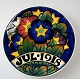 Aluminia 
juleplatte, 
1918. Danmark. 
Polykrom 
dekoration med 
blomster. 
Stemplet.: 
Aluminia. Dia.: 
...