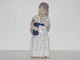 Royal 
Copenhagen 
figurine, girl 
with doll.
Decoration 
number 3539.
Factory ...