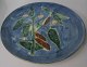 Danish dish in 
slip-decorated 
earthenware, c. 
1900. Decorated 
in blue, green 
and brown. 
Motif in ...