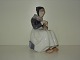 Large Royal 
Copenhagen 
Figure, Amager 
girl who knits
Dek. No. 1317
Measuring 23 
...