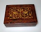 Italian wooden 
box with 
marquetry, 19th 
century. Walnut 
wood. 
Decoration in 
the form of the 
bird ...