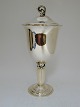 Covered cup 
vase, silver 
(830) of 
Heimbürger. 
Produced 1952. 
Height 31 cm