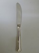 Cohr. Old 
Danish. Dinner 
knife. Length 
20 cm (handle 
10.3 cm). 
Silver (830).