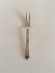 Georg Jensen 
Pyramid 
Sterling Silver 
Lemon Fork No 
146. Measures 
11,5cm.