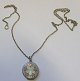 Sterling chain 
with enameled 
photo store. 
20th century. 
Chain Length .: 
60 cm. Dia. 
photo store: 
...