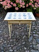 1800 Century 
tile table with 
15 Dutch blue 
landscape tiles 
  H. 72 cm. top 
77 x 50 cm. No. 
217037