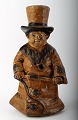 English figure 
in stoneware 
after Charles 
Dickens "Oliver 
Twist".
1870s. 
Charming 
figurine of ...