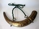 Arabic powder horn, brass, 19th century. With numerous decorations on the outside. L .: 30 cm. ...