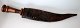 Arabic curved 
dagger, 19th 
century. 
Leather sheath. 
Double-edged. 
With handle in 
Horm. Sheath 
...