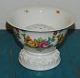 Flower Bowl 
with matching 
flower holder 
in porcelain 
from Rosenthal. 
Decorated with 
flowers. In ...