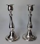 Pair baluster 
candlesticks in 
sterling 
silver, Svend 
Toxv&aelig;rd, 
Copenhagen. 
Completed. ...