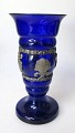 Danish vase in 
cobalt blue 
glass with tin 
mounting, c. 
1920, Denmark. 
Mounting in the 
form of ...