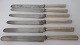 6 antique 
silver knife, 
19th century. 
Blade stamped 
.: Heckmann, 
Kiel. Stamped 
with master ...