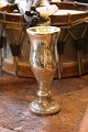 Old mug on foot 
in mercury 
silver with a 
fine, a little 
rough patina. 
Height: 18.5cm.