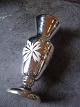 Old French vase 
in Mercury 
silver , 
decorations on 
the side and 
with a fine 
patina. 
Height: 24cm.