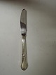 Rosenholm. 
Dinner knife. 
Silver (830). 
Length 22 cm.