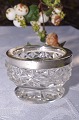 Salt cellar, 
glass with 
silver 830s. 
Height 3,5 cm. 
Diameter 5,1 
cm. Condition : 
Signs of use. 
...