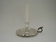 Candlesticks. 
Silver (830). 
Made of F. Dahl 
1853. Diameter 
16 cm. Height 7 
cm.