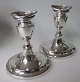 Pair of 
candlesticks in 
silver, 
tulip-shaped, 
1956, A. 
Halberstadt, 
Copenhagen. 
Oval feet. ...