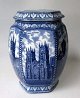 English tea 
caddy, 20th 
century. 
Earthenware. 6 
sided with lid. 
With designs in 
blue: Durham 
...