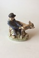 Royal 
Copenhagen 
Figurine boy 
with calf No 
772. Measures 
17 cm / 6 11/16 
in. x 18 cm / 7 
3/32 ...