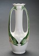 Art Nouveau 
porcelain vase 
decorated with 
two handles in 
the shape of 
fish. 
Stamped 
Rorstrand. ...
