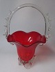 Venetian glass 
vase in the 
shape of a 
basket, 20th 
century. Clear 
and red glass. 
H .: 28 cm