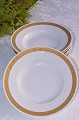 RC. Fan gold 
Royal 
Copenhagen 
porcelain. 
Royal 
Copenhagen Fan 
gold, Deep 
plate no. 
414-11515. ...