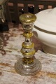 Old candlestick 
in mercury 
glass with 
fine, a little 
worn patina. 
Height: 21.5cm.