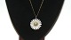 A. Michelsen 
Daisy Pendant 
Sterling 
Silver.
Diameter 3.1 
cm.
Chain A.M 
Double Length 
43 cm.