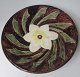 Danish 
earthenware 
dish, c. 1900. 
With 
decorations in 
the shape of a 
flower and 
foliage. Glaze 
...