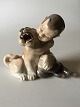 Royal Copenhagen Figurine Faun with lioncub No 2852