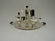 Michelsen .  
Minature coffee 
set. Sterling 
(925). Made 
1927.  Tray 
(Tray diameter 
22 cm plus ...