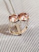 Silver ring.
with two pink 
diamond cut 
colored 
crystals ..
Silver 925
Ring size: 56