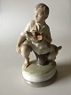 Royal Copenhagen Figurine of Boy with dog No 2140